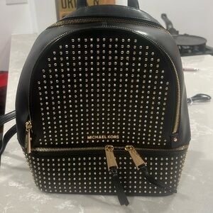 Pre owned studded Michael Kors backpack.